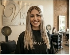 Ash blonde balayage — soft, sun-kissed tones blended through mid-lengths and ends