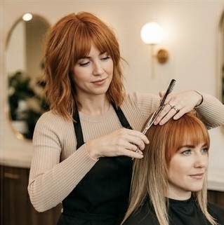 Fringe shaping — precision scissor work to perfect the fringe line