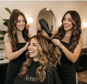 Team collaboration — Velo Co. stylists consulting on a creative look