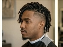 Short locs — neatly maintained and styled short dreadlocks
