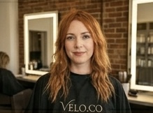 Ginger layers — warm ginger tones cut into movement-rich long layers