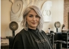 Icy blonde waves — platinum cool-toned blonde styled into soft waves