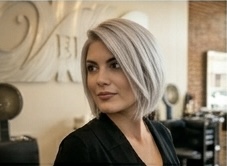 Silver bob — cool silver tones on a sleek, blunt bob silhouette