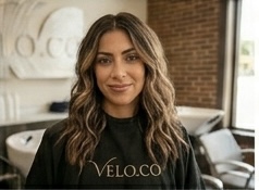Brunette volume — rich brown hair styled for maximum body and movement